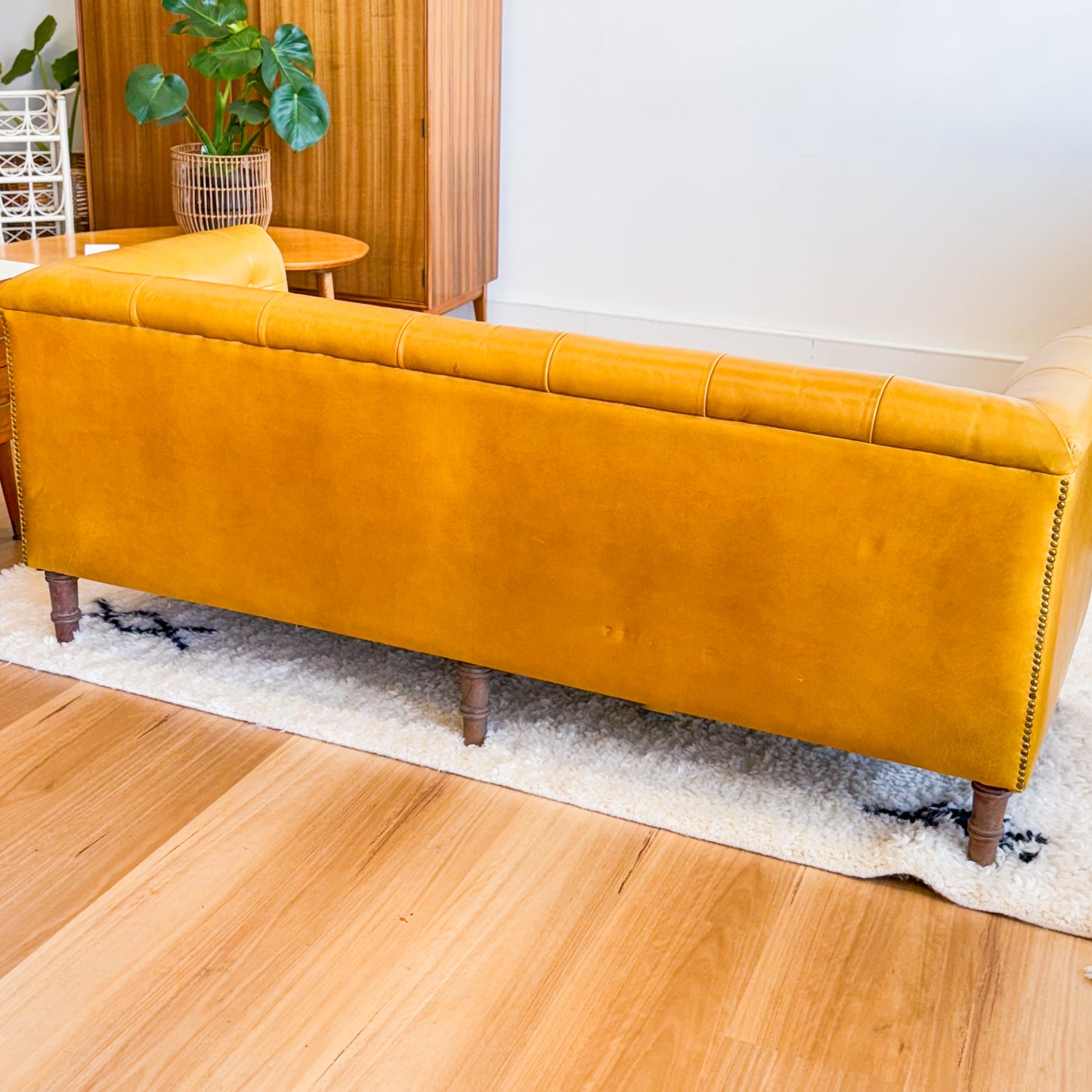 Mustard leather look sofa