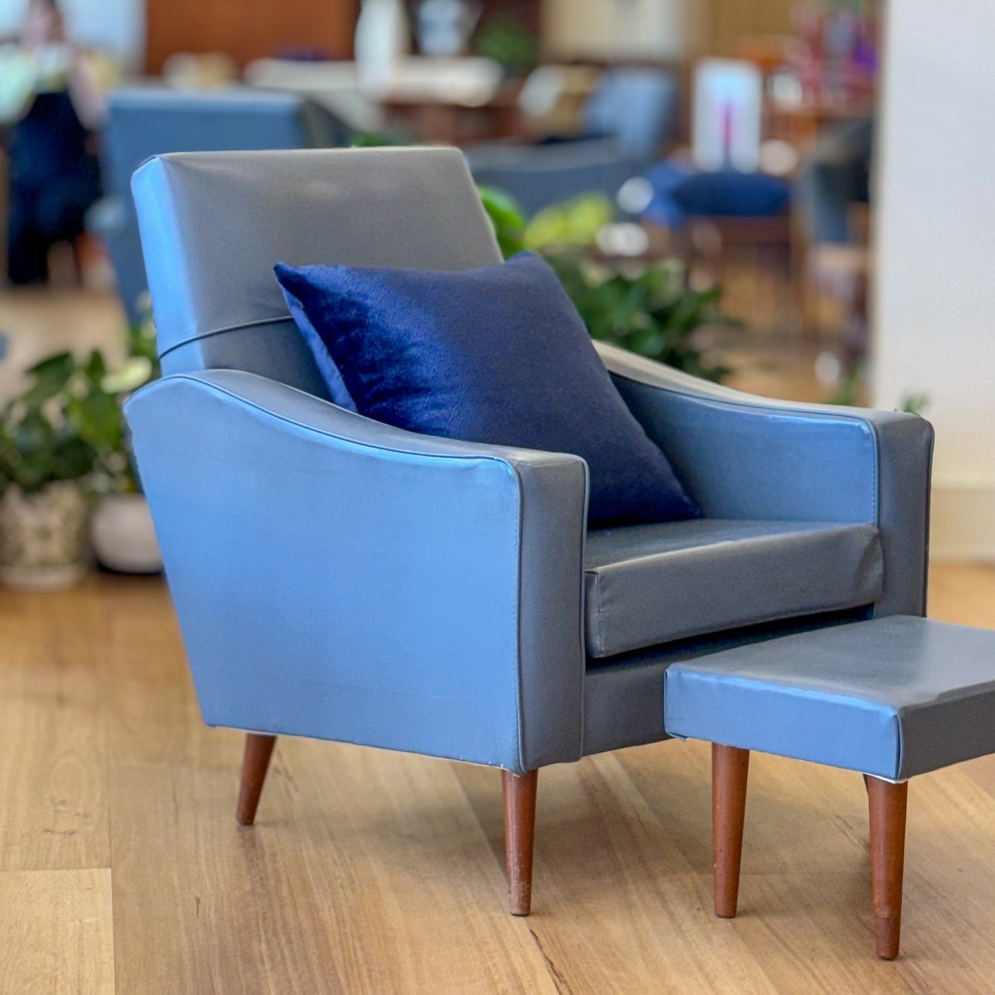 Blue Vinyl armchair and matching footstool