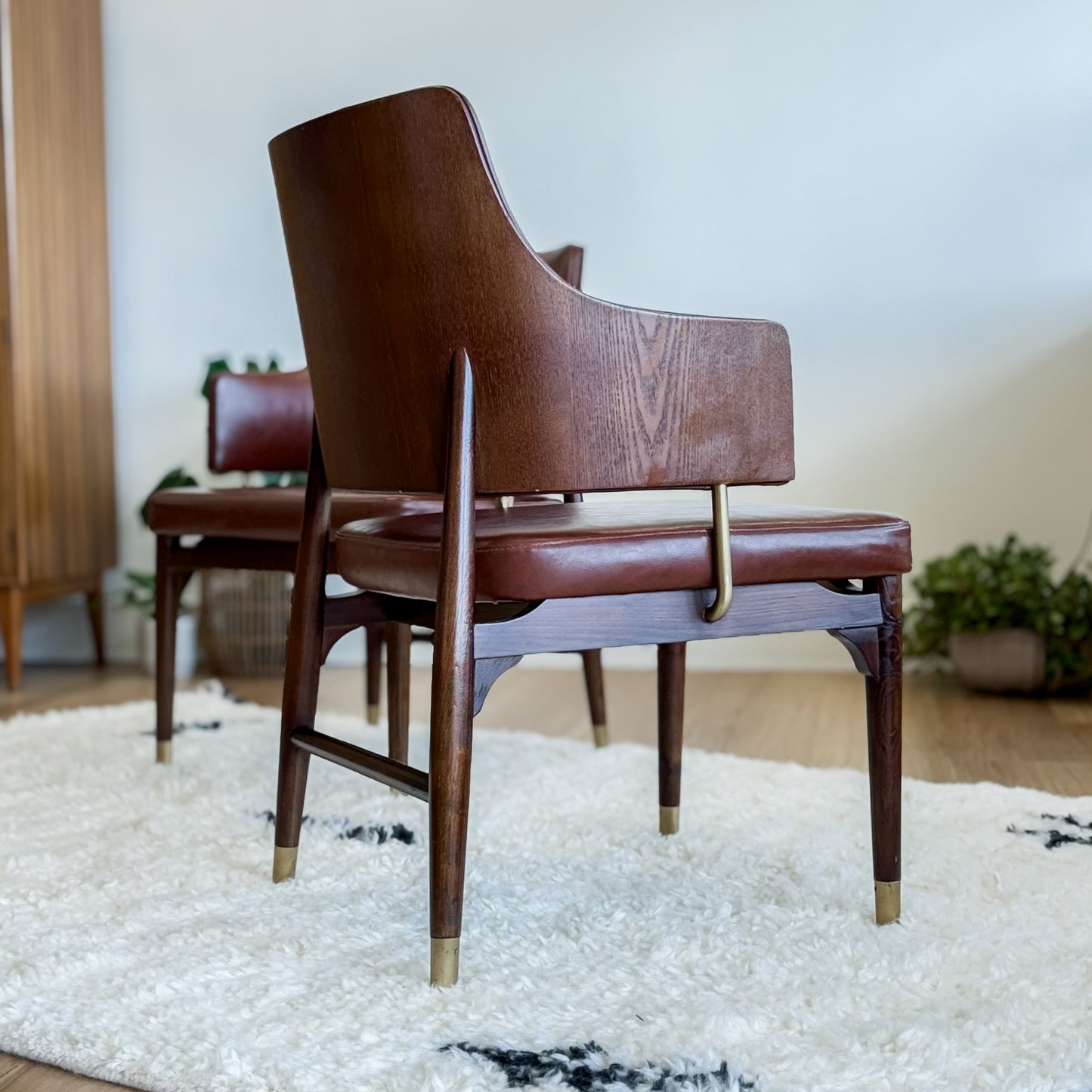 Pair Of Mid C20th Vinyl Upholstered Tub Chairs With Cigar Legs And Brass Accents