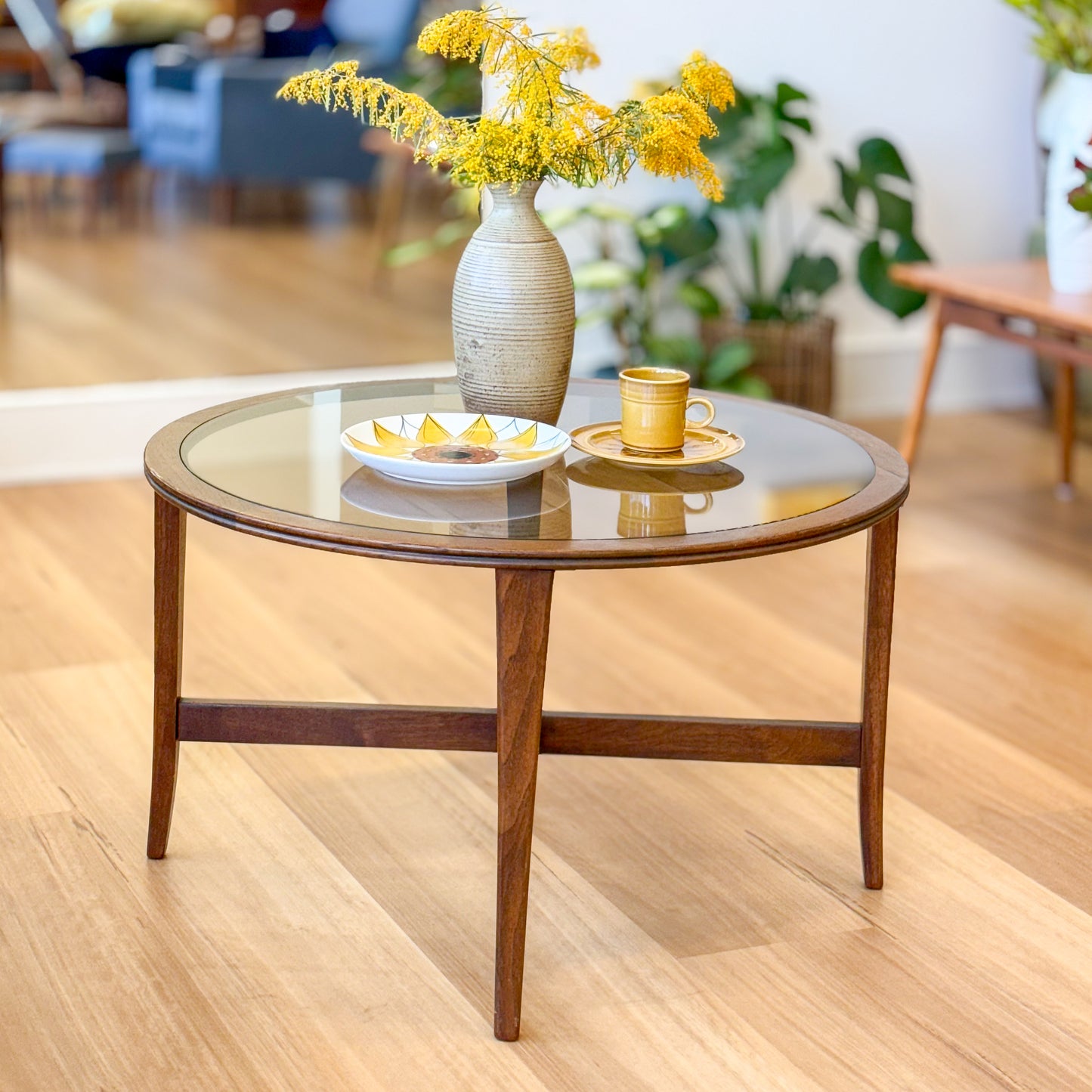 Chiswell Smokey glass top round coffee table