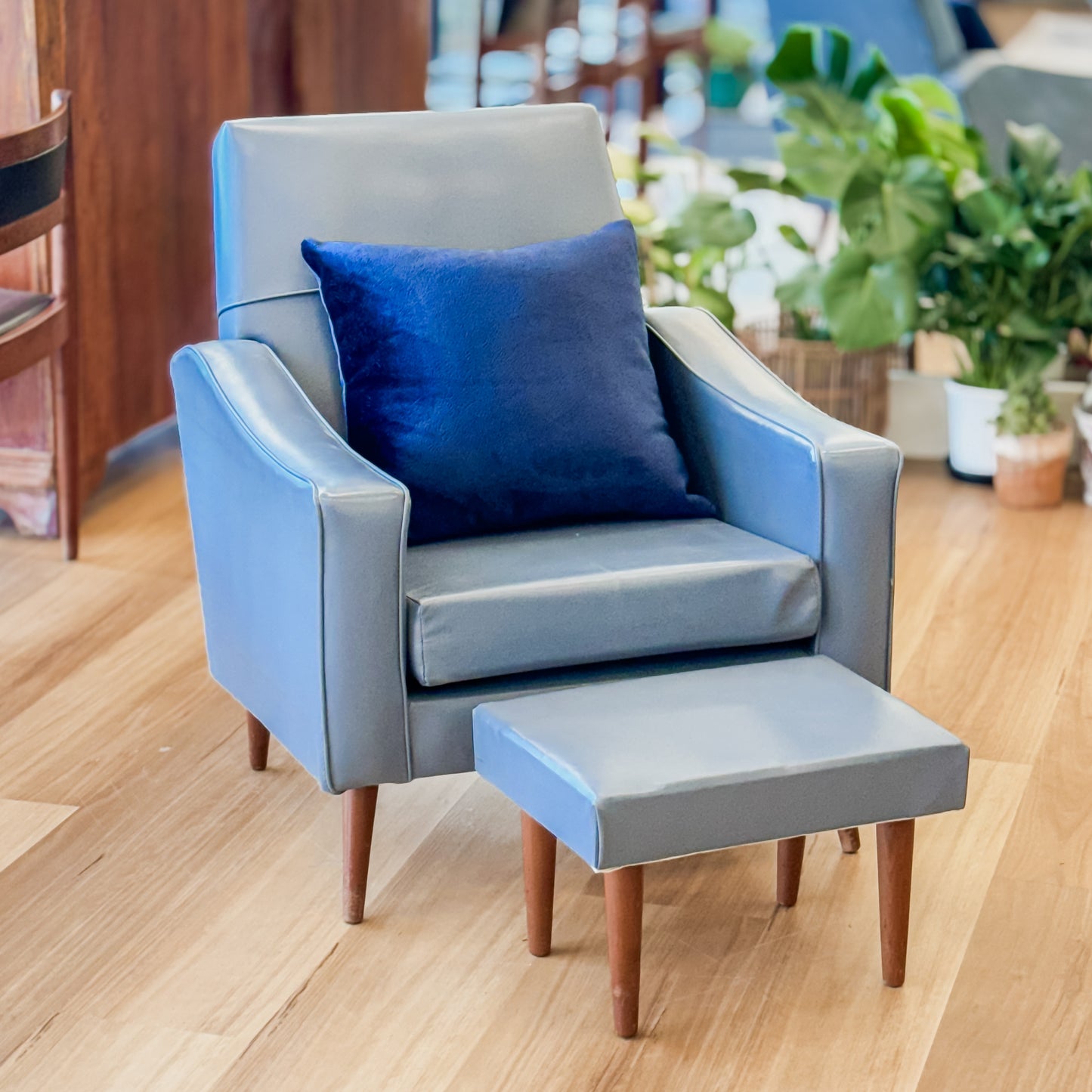 Blue Vinyl armchair and matching footstool