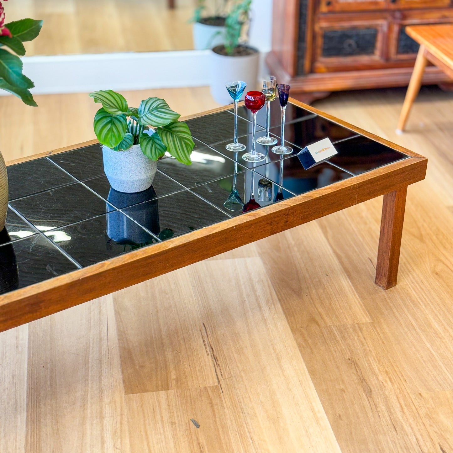 Black tiled top coffee table