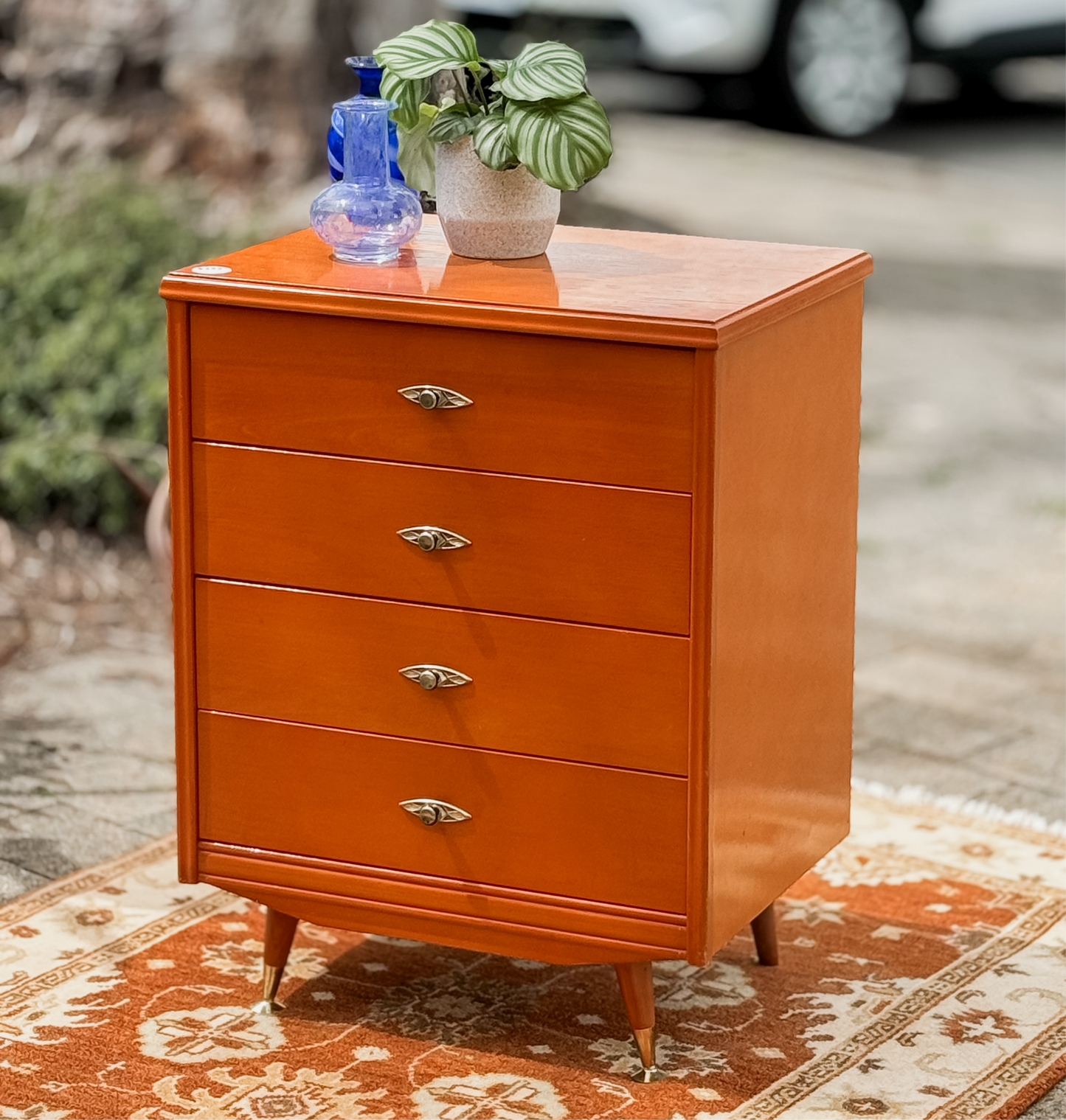 Retro chest of drawers on cigar legs