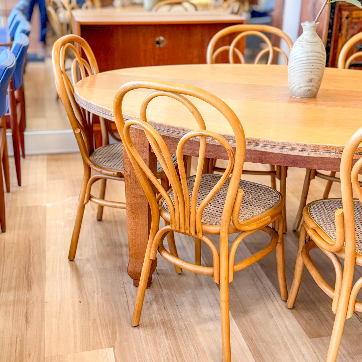 Tasmanian Oak dining table and six bentwood chairs