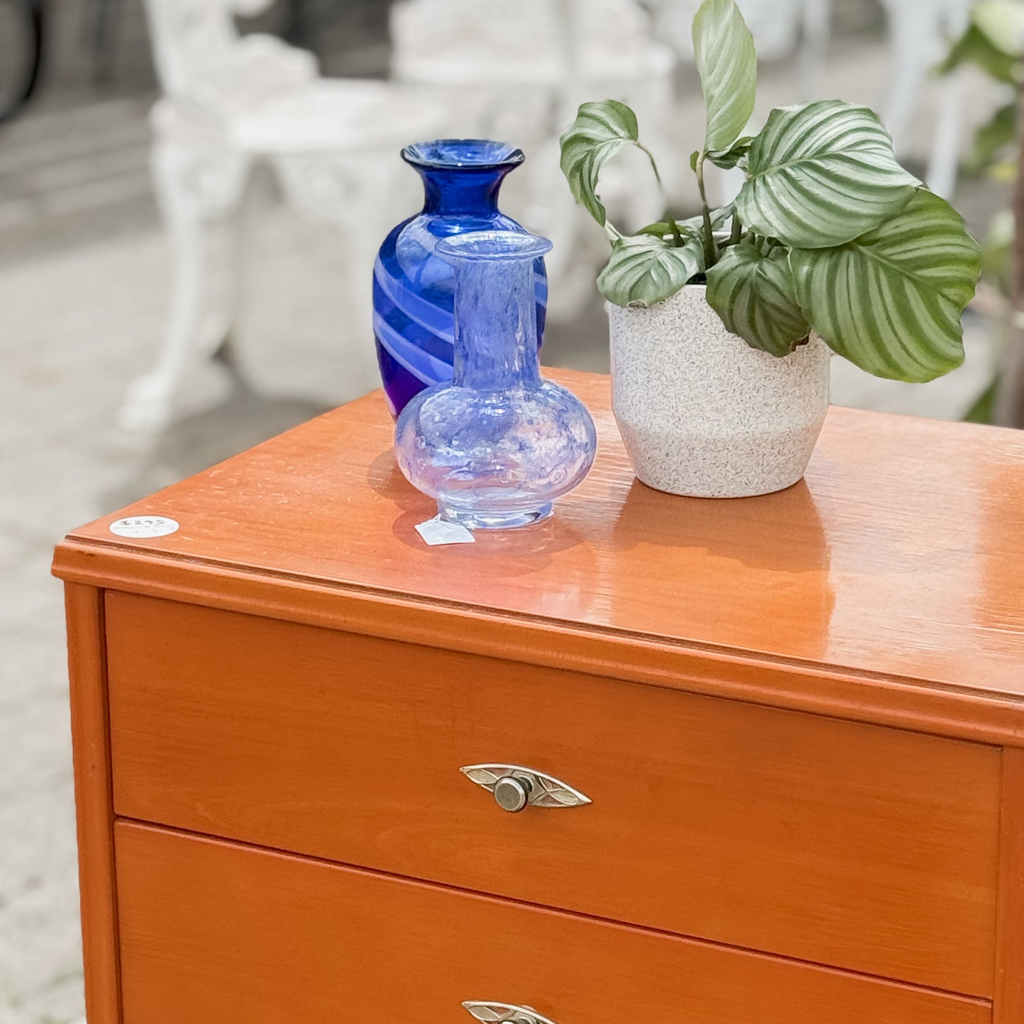 Retro chest of drawers on cigar legs