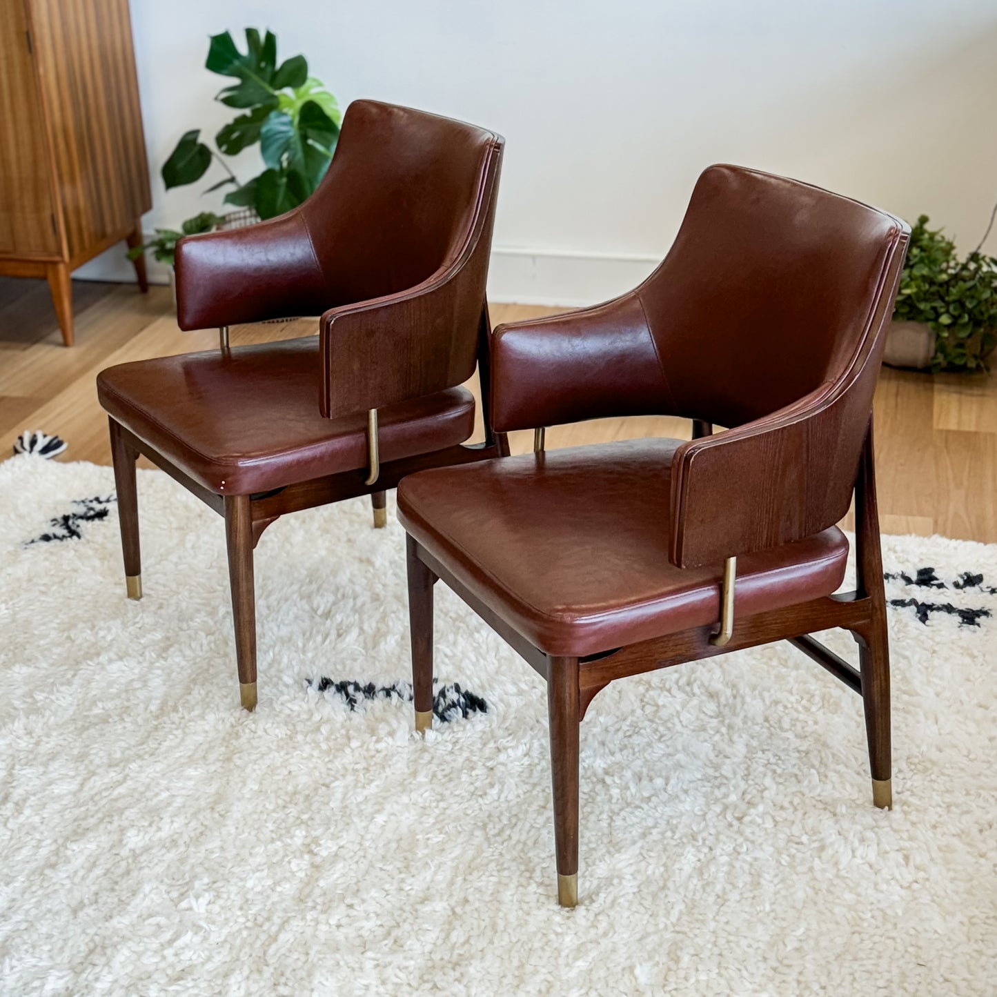 Pair Of Mid C20th Vinyl Upholstered Tub Chairs With Cigar Legs And Brass Accents