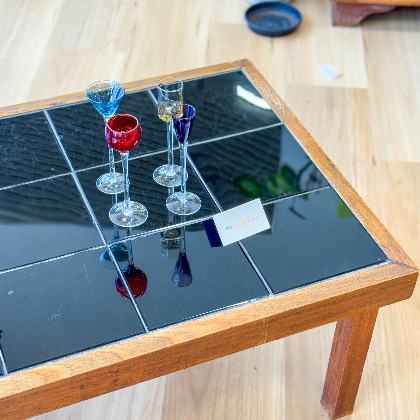 Black tiled top coffee table