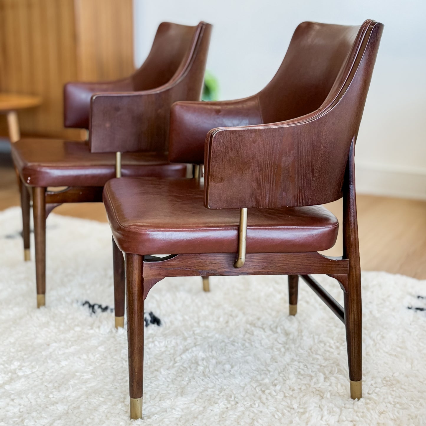 Pair Of Mid C20th Vinyl Upholstered Tub Chairs With Cigar Legs And Brass Accents