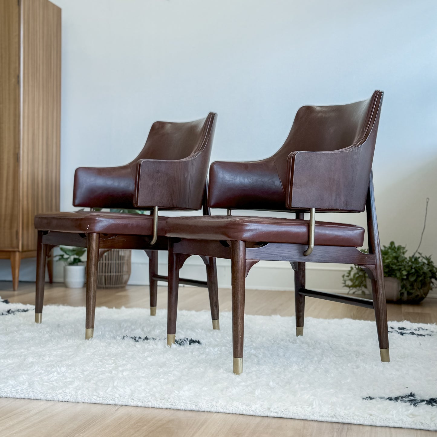 Pair Of Mid C20th Vinyl Upholstered Tub Chairs With Cigar Legs And Brass Accents