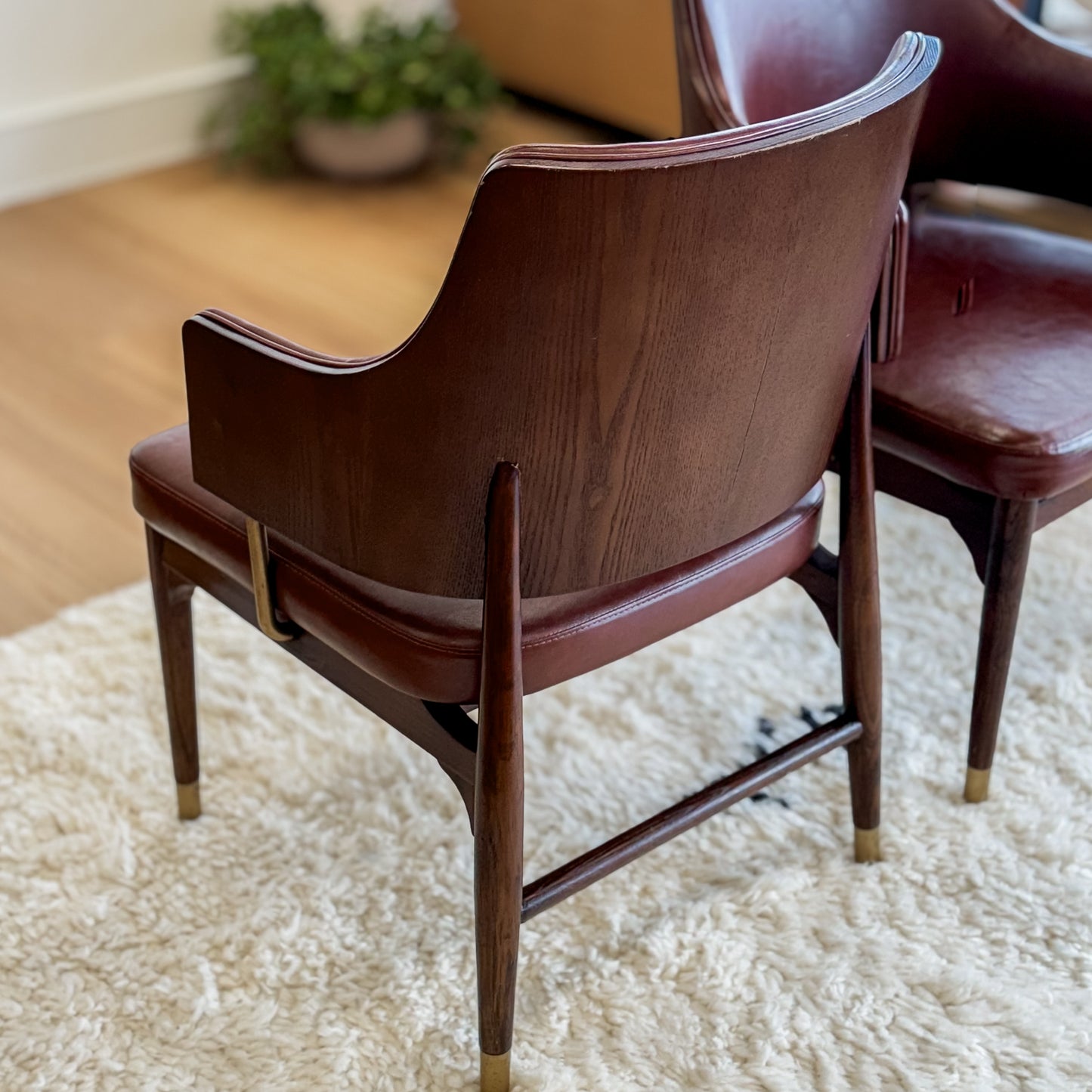 Pair Of Mid C20th Vinyl Upholstered Tub Chairs With Cigar Legs And Brass Accents