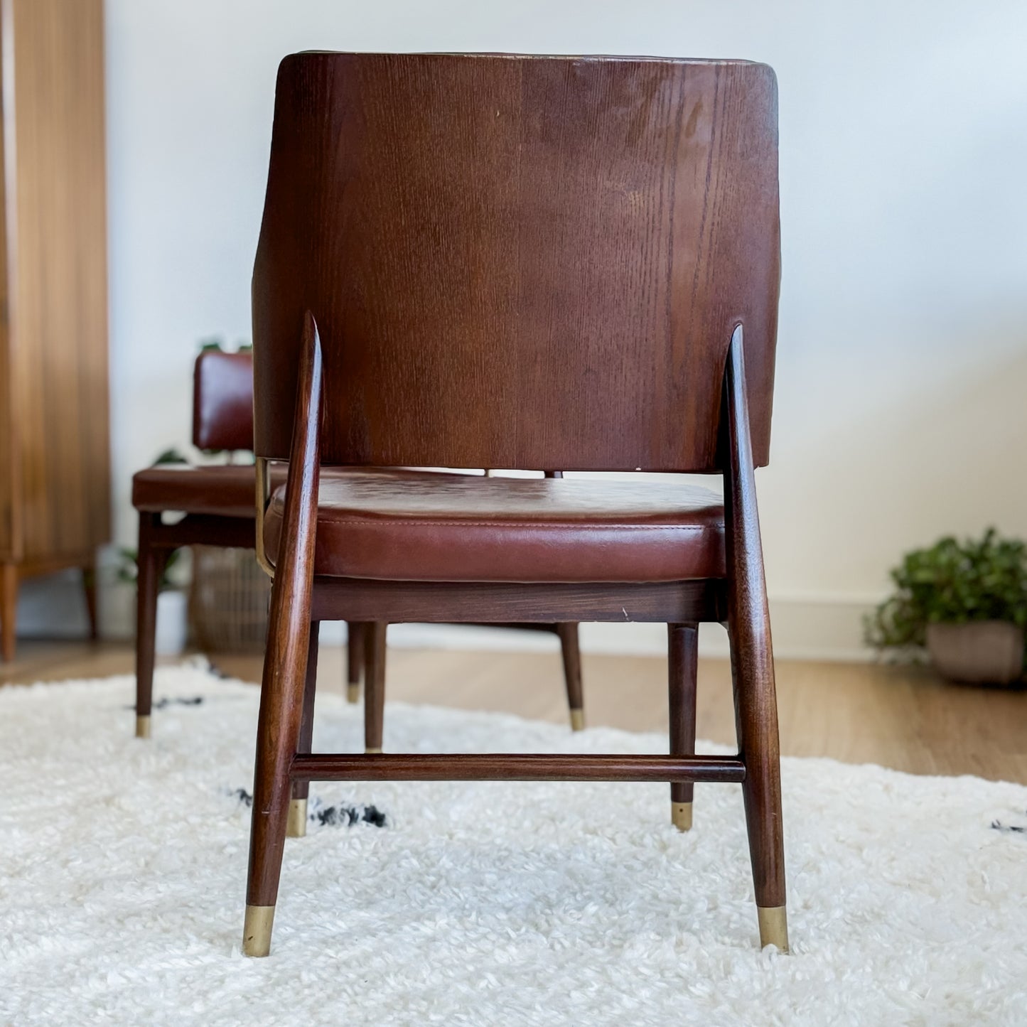 Pair Of Mid C20th Vinyl Upholstered Tub Chairs With Cigar Legs And Brass Accents