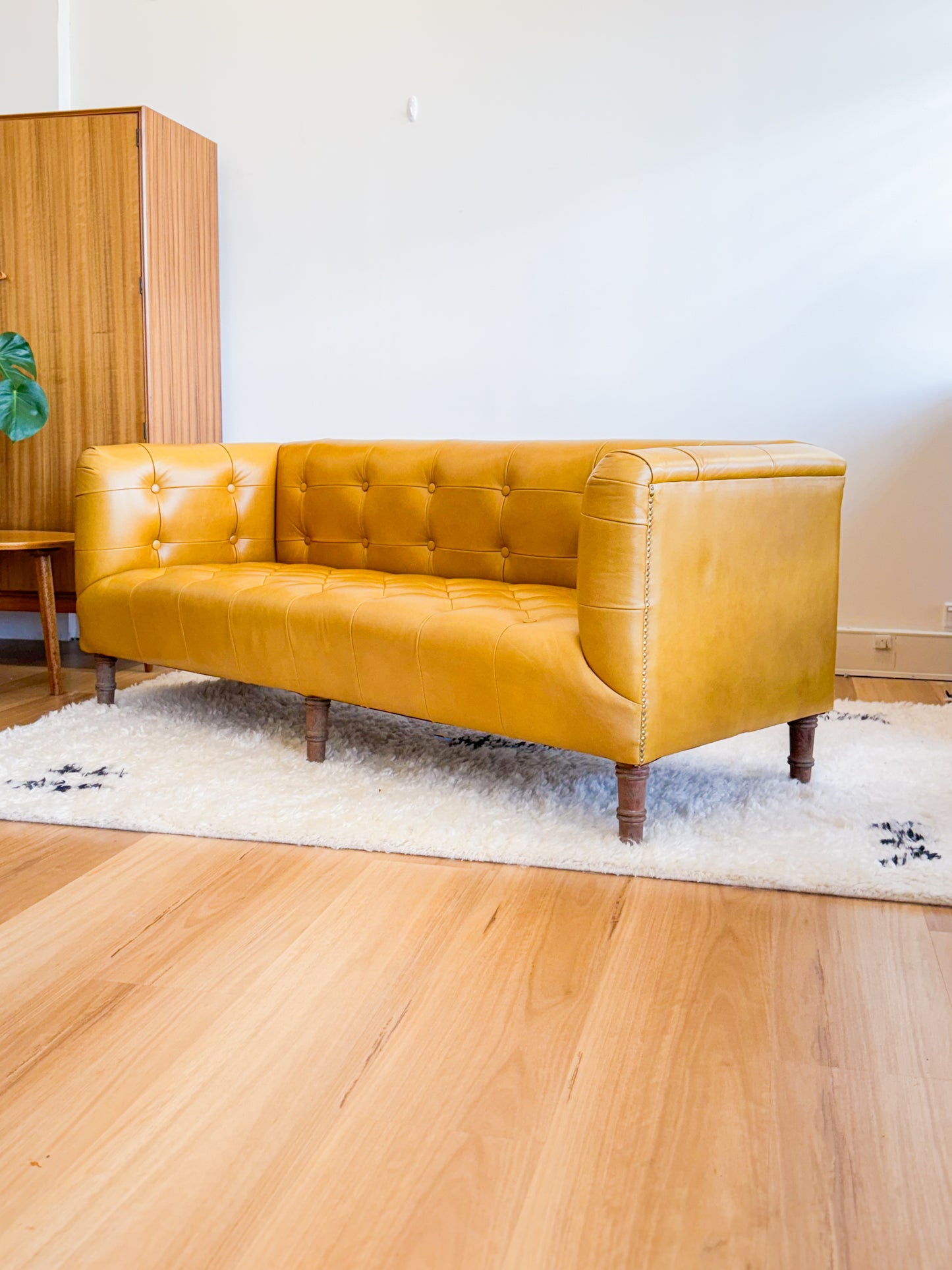 Mustard leather look sofa