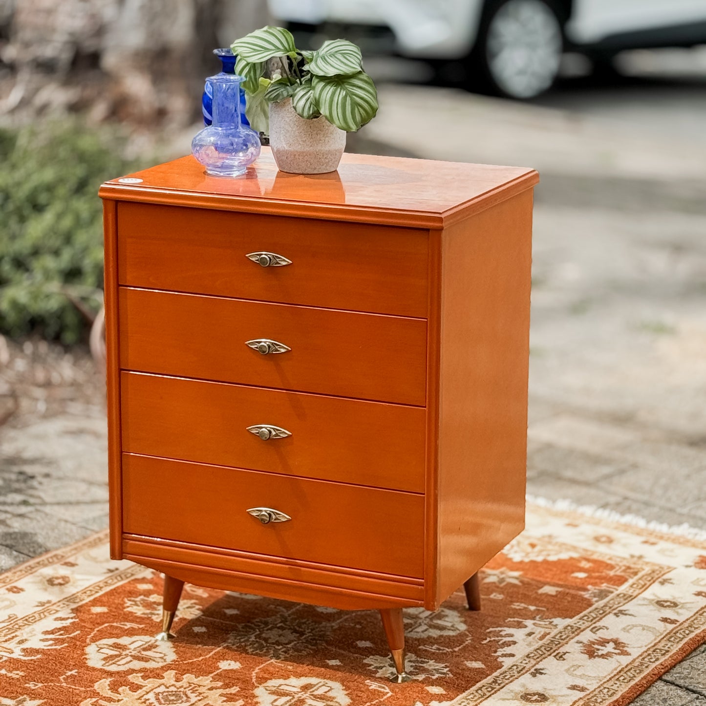 Retro chest of drawers on cigar legs