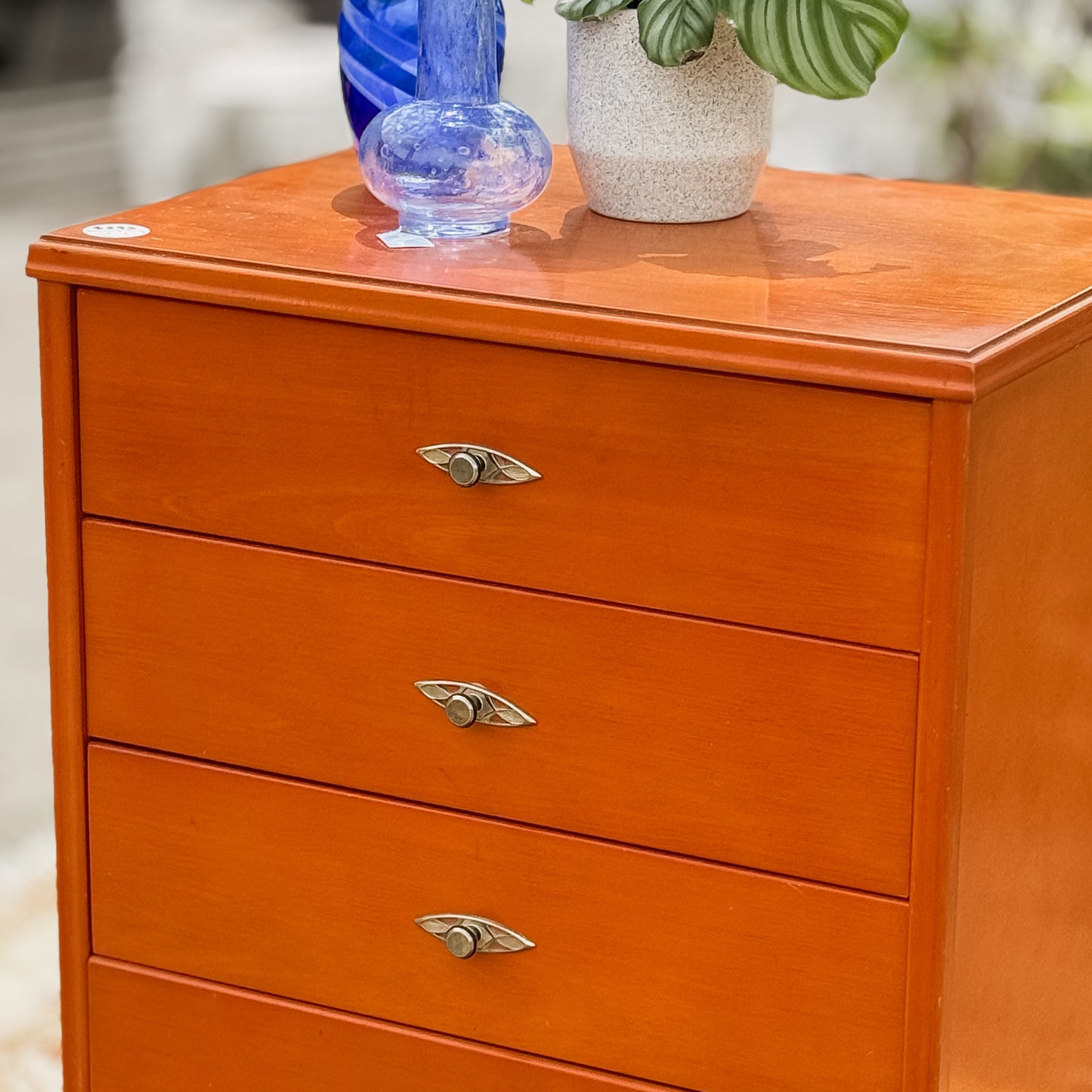 Retro chest of drawers on cigar legs