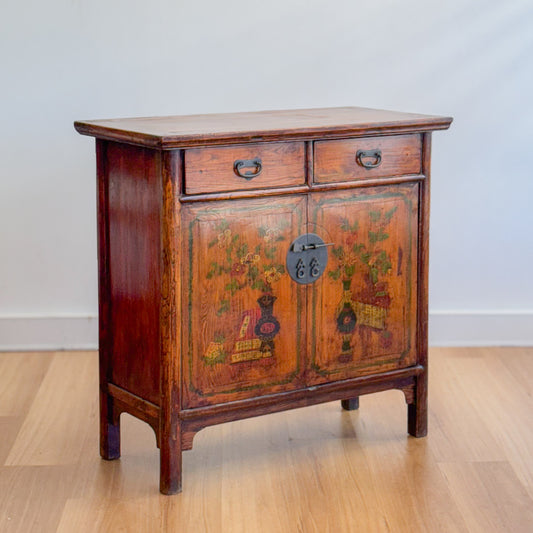 Nepalese hardwood cabinet with floral painted doors and brass fittings