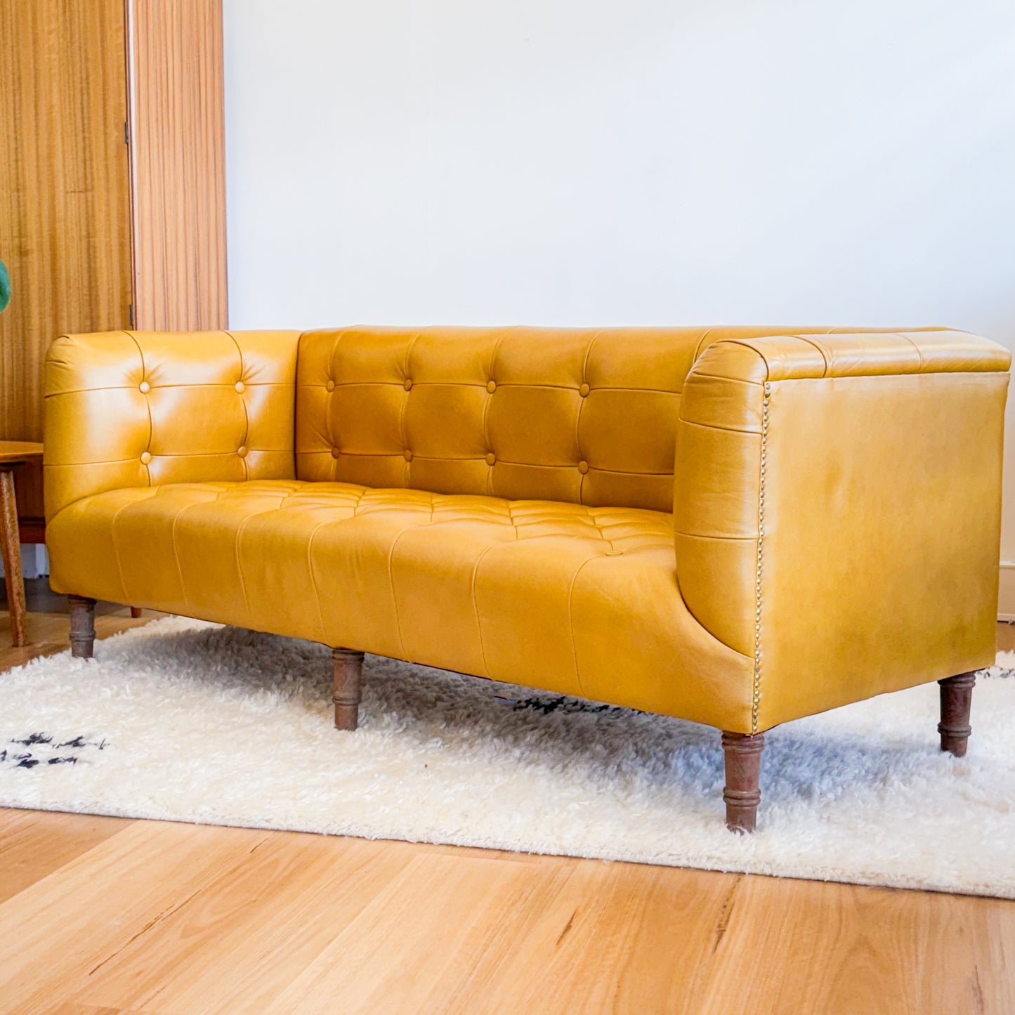 Mustard leather look sofa