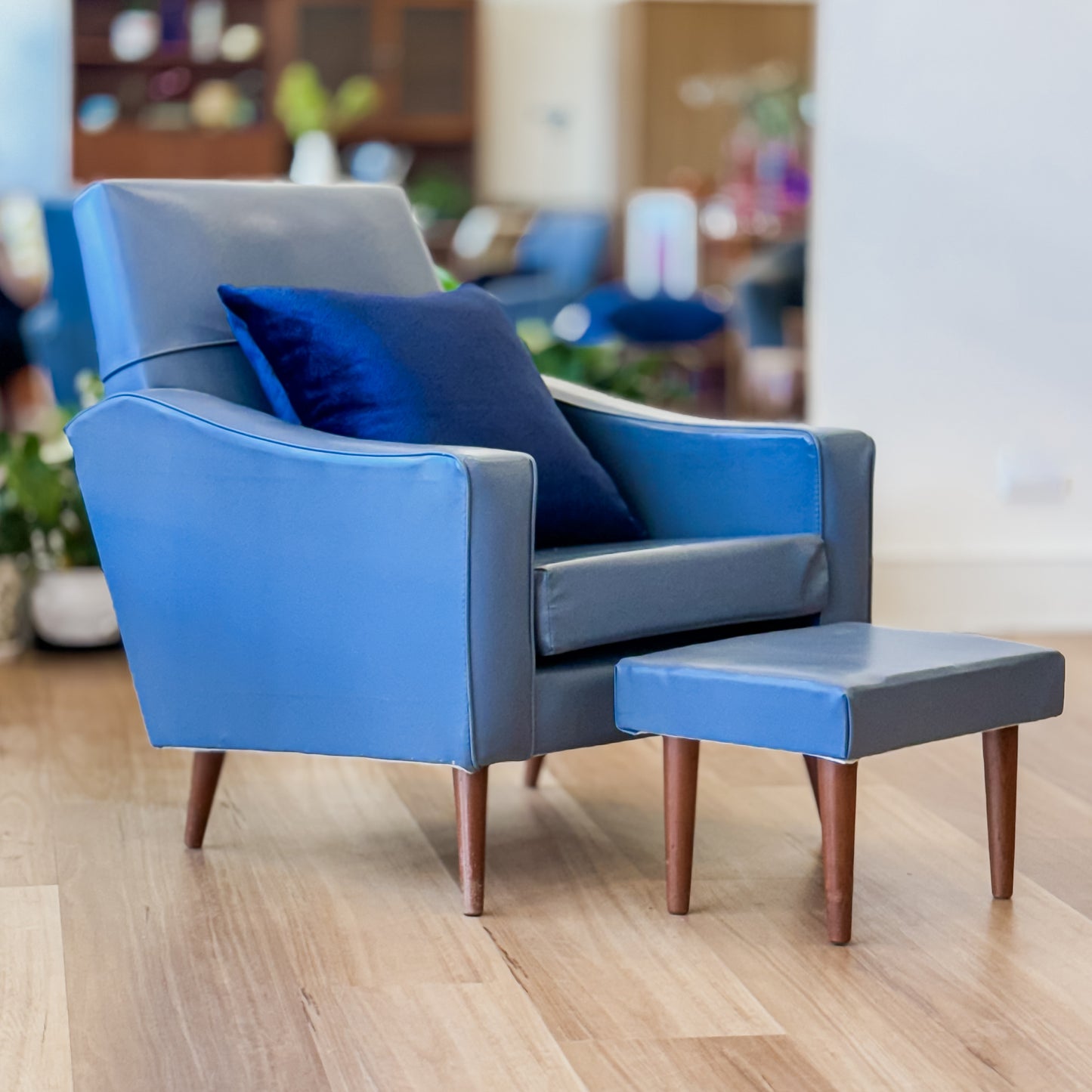 Blue Vinyl armchair and matching footstool