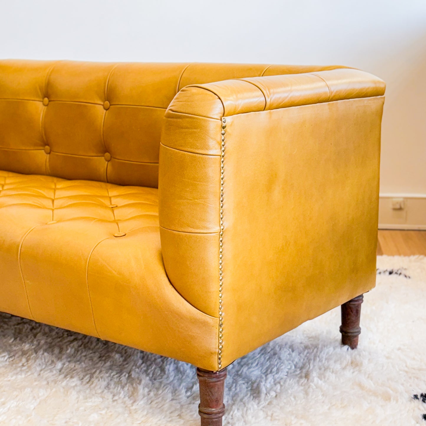 Mustard leather look sofa