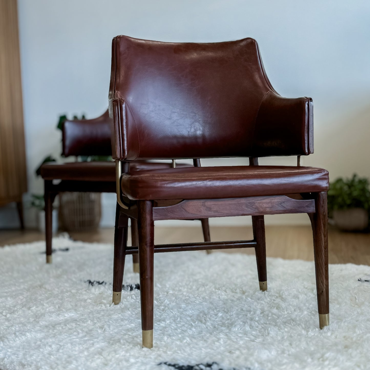 Pair Of Mid C20th Vinyl Upholstered Tub Chairs With Cigar Legs And Brass Accents