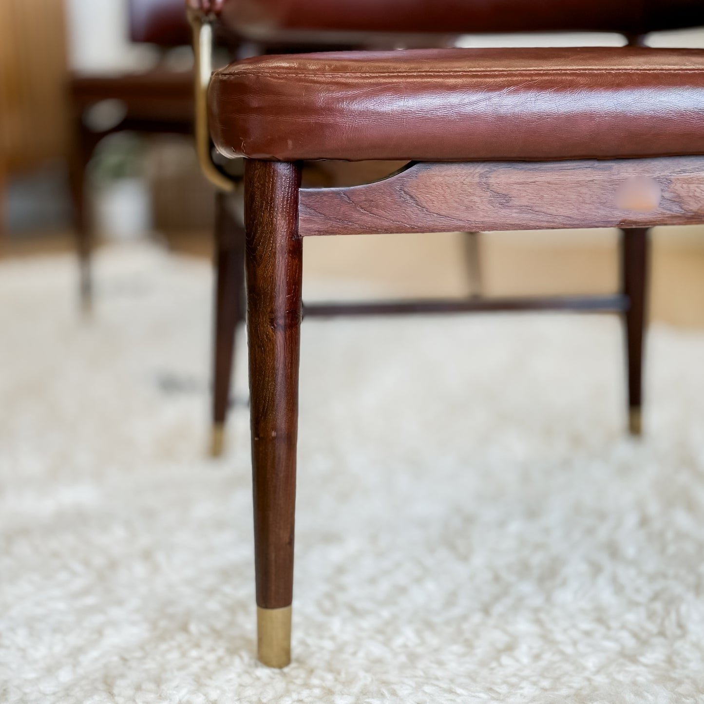 Pair Of Mid C20th Vinyl Upholstered Tub Chairs With Cigar Legs And Brass Accents