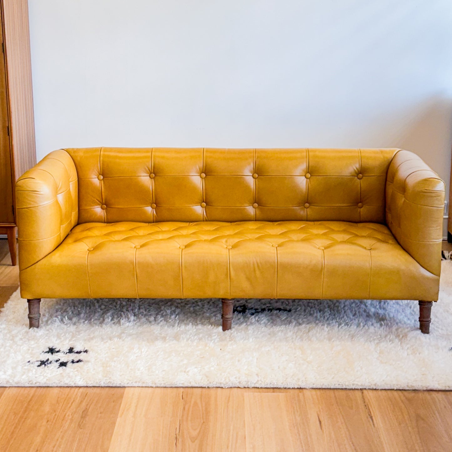 Mustard leather look sofa