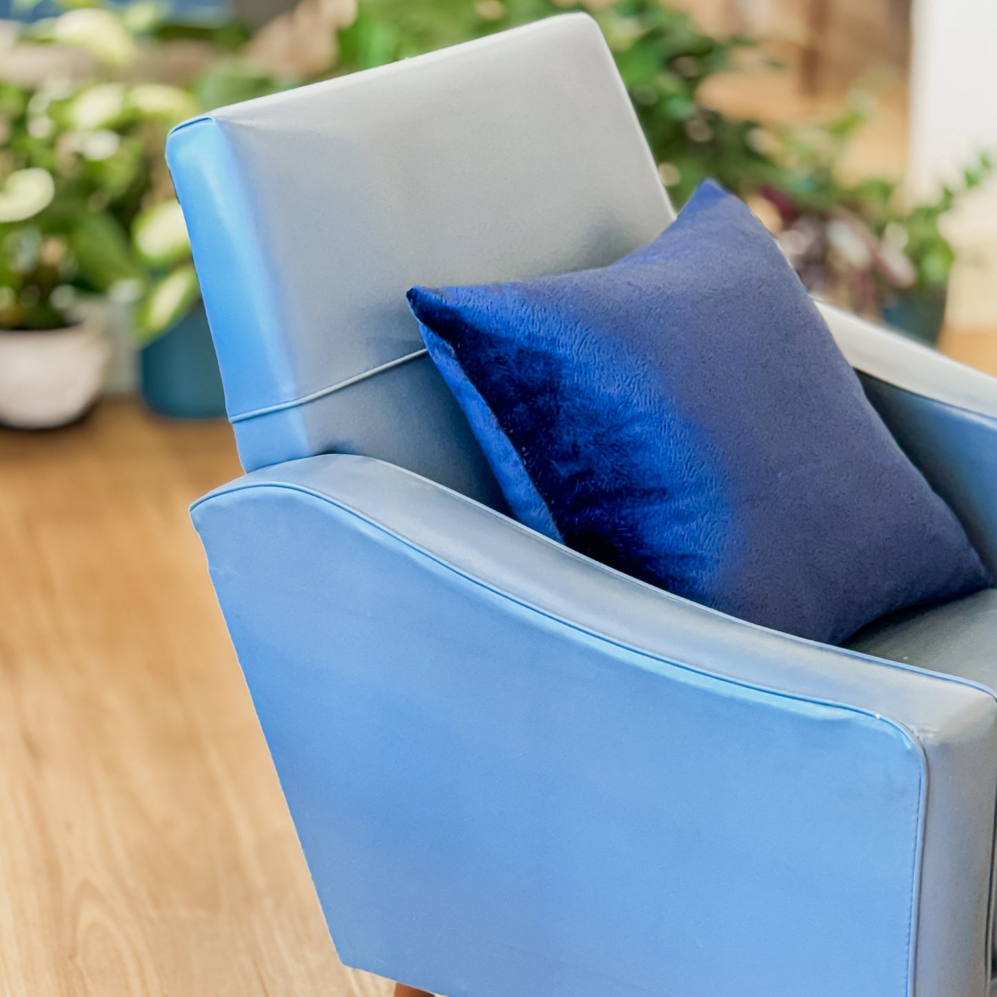 Blue Vinyl armchair and matching footstool