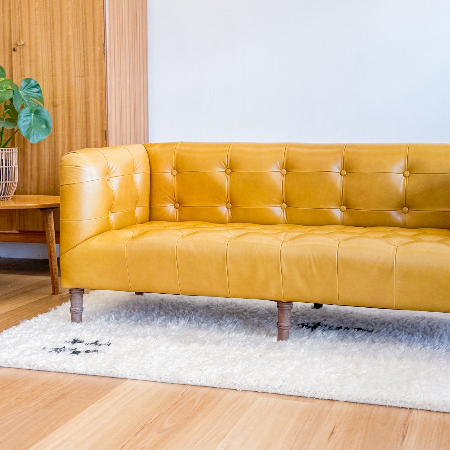 Mustard leather look sofa