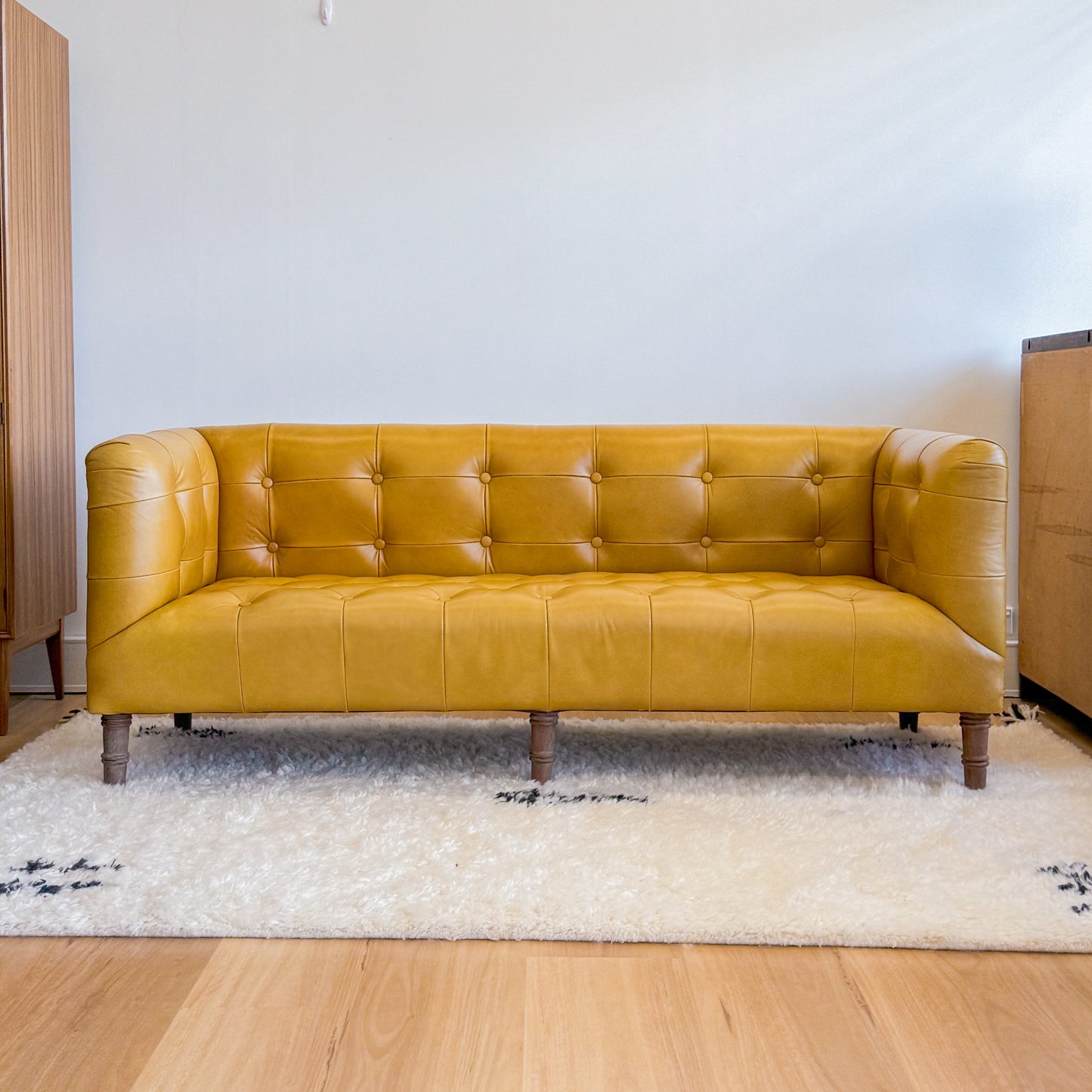 Mustard leather look sofa